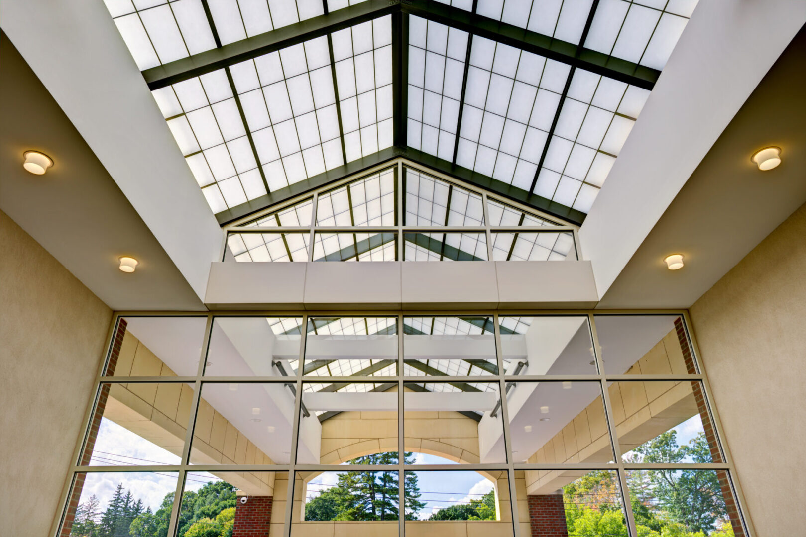 A large glass ceiling in an indoor building.